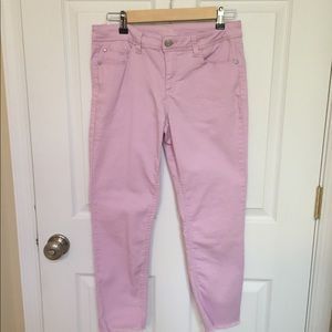 Pink ankle skinny jeans size 8 fringe bottom.